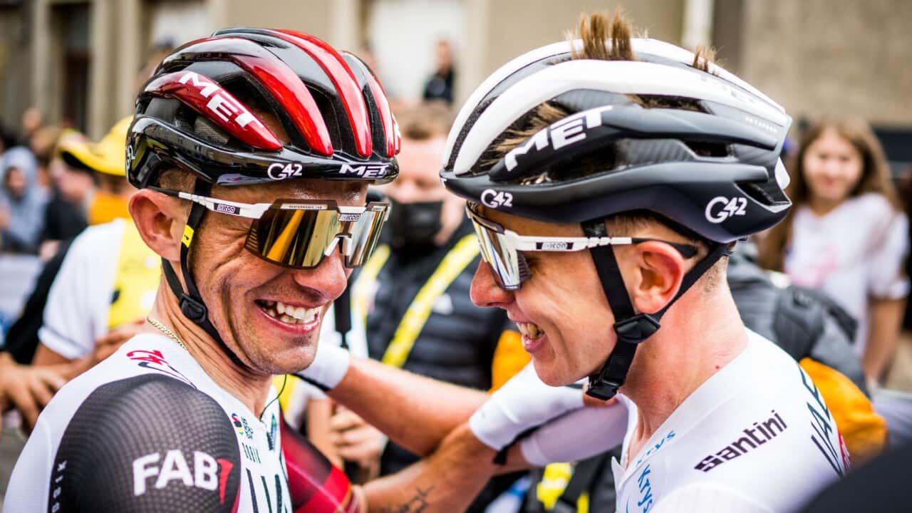 Brandon McNulty congratulates Tadej Pogačar after winning Stage 6 of the 2022 Tour de France