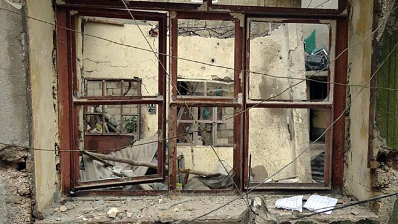 syria_homs_120210_aap_2121459596