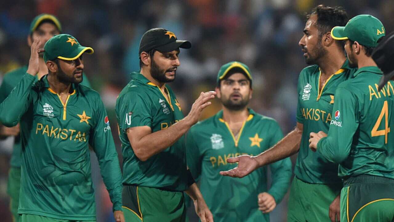 Pakistan's Shoaib Malik (L), Pakistan captain Shahid Afridi (C) and Wahab Riaz (2L) celebrate after dismissing India's Yuvraj Singh during the World T20 cricket tournament match between India and Pakistan at the Eden Gardens cricket stadium in Kolkata on
