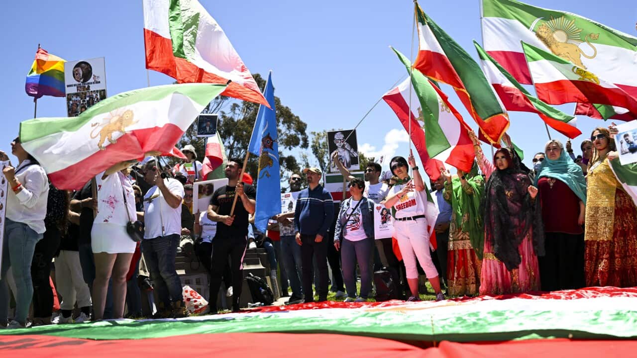 Protesters stand in solidarity with Iranians last year (AAP).jpg