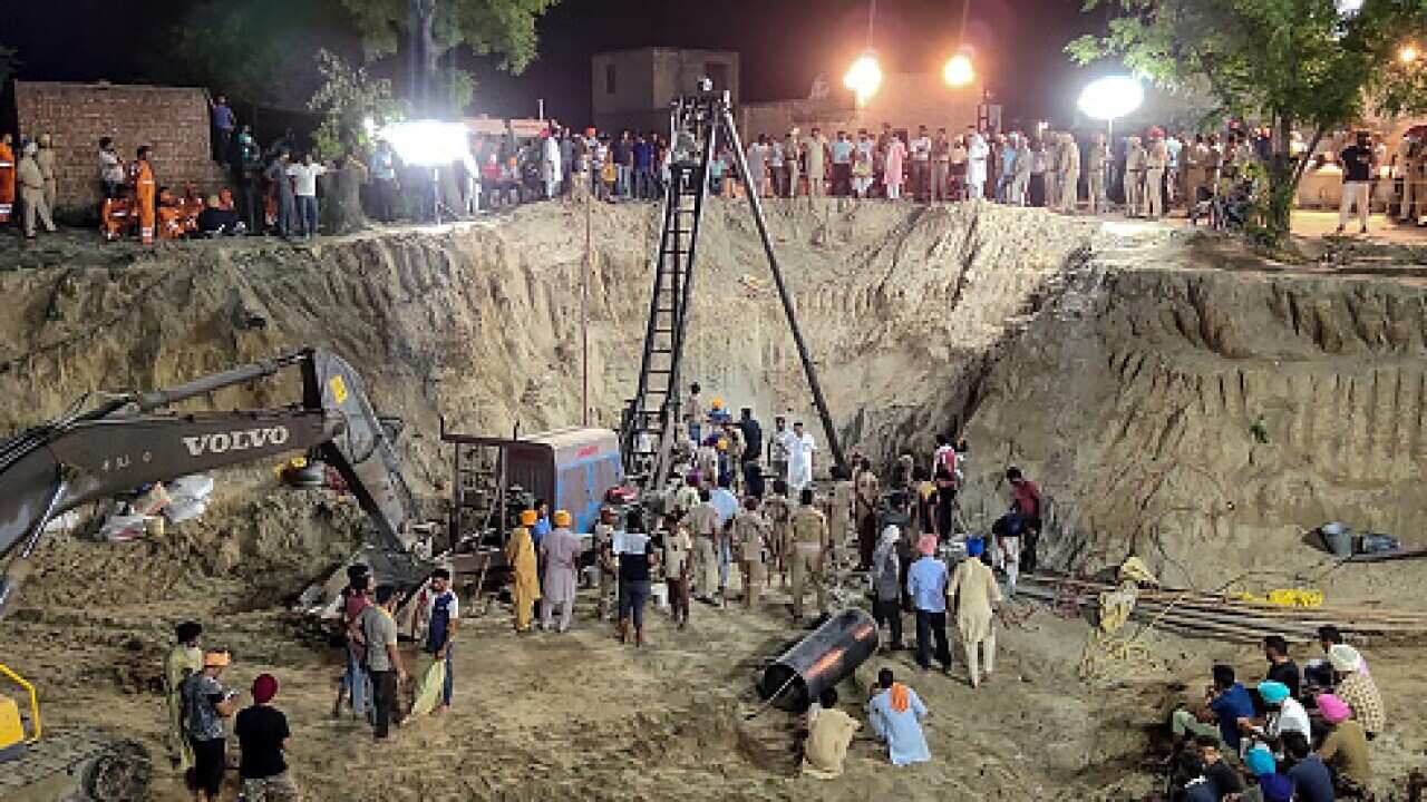 Recovery operation for a toddler down a well