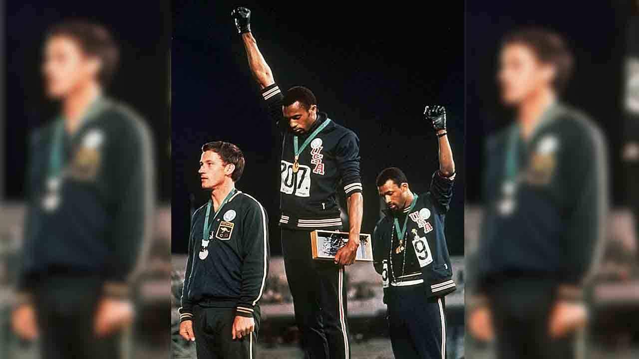 Australian Olympian Peter Norman receiving his silver medal at the 1968 Mexico Olympics.