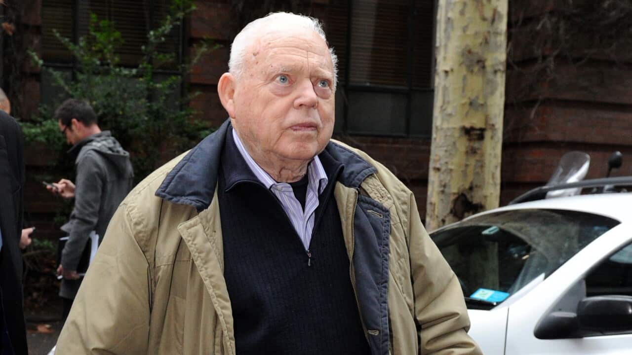 Car racing legend Bob Jane leaves the Supreme Court of Appeal in Melbourne, Friday, Aug. 9, 2013. The Ex-racing car driver and tyre retailer lost his bid to sue his son Rodney Jane for millions of dollars.