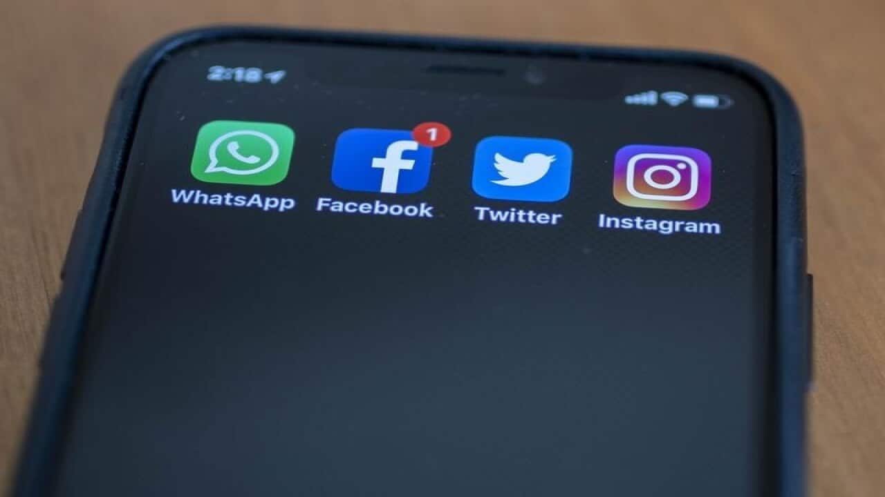 Smart phone is seen displaying social media app icons (file image)