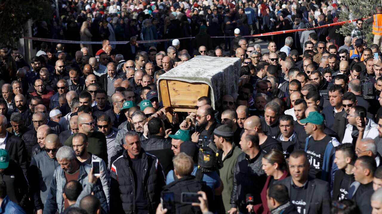 Mourners carry the coffin of Aya Maasarwe during the funeral at her hometown of Baqa al-Gharbiya, Israel.