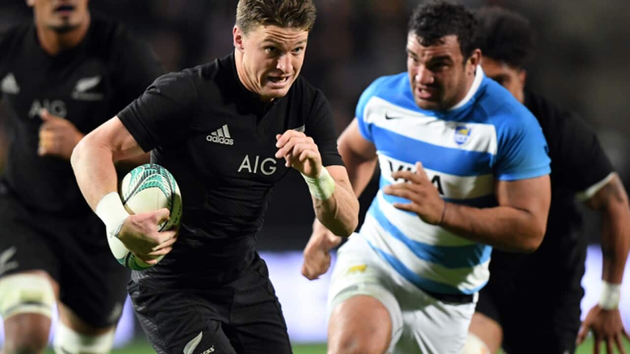 Beauden Barrett of New Zealand (left) and Agustin Creevy of Argentina