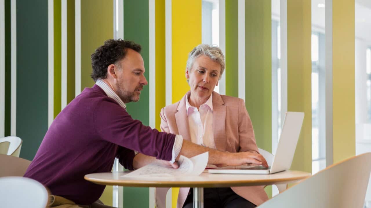 Business people discussing plans in cafe