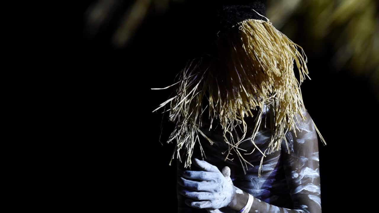 The Injinoo Dance Group welcome to country Prime Minister Tony Abbott on the Injinoo Foreshore, Bamaga in the Northern Peninsula area.