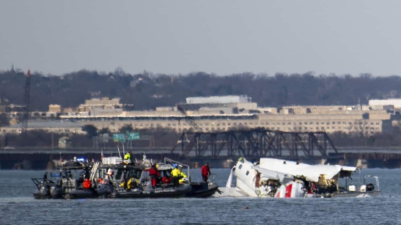 Plane wreckage is seen in the Potomac River near Ronald Reagan Washington National Airport