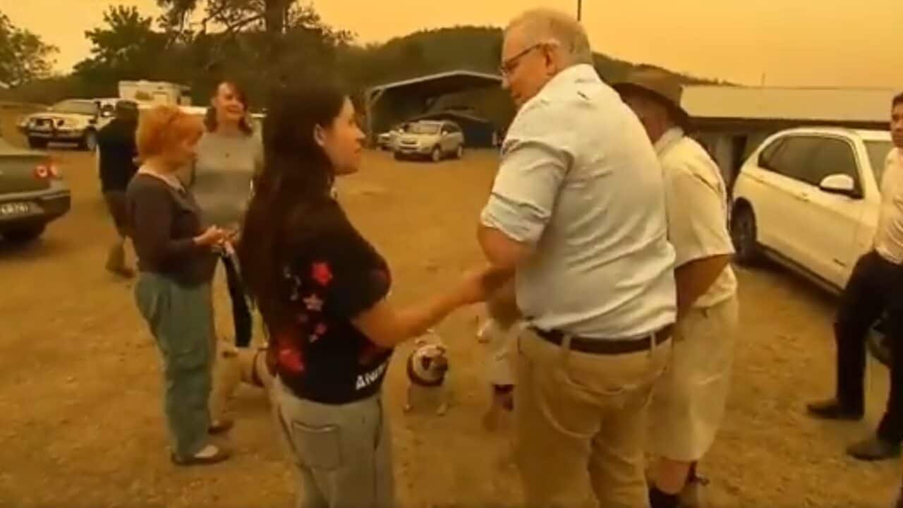 Scott Morrison meets with Cobargo resident Zoey Salucci-McDermott.