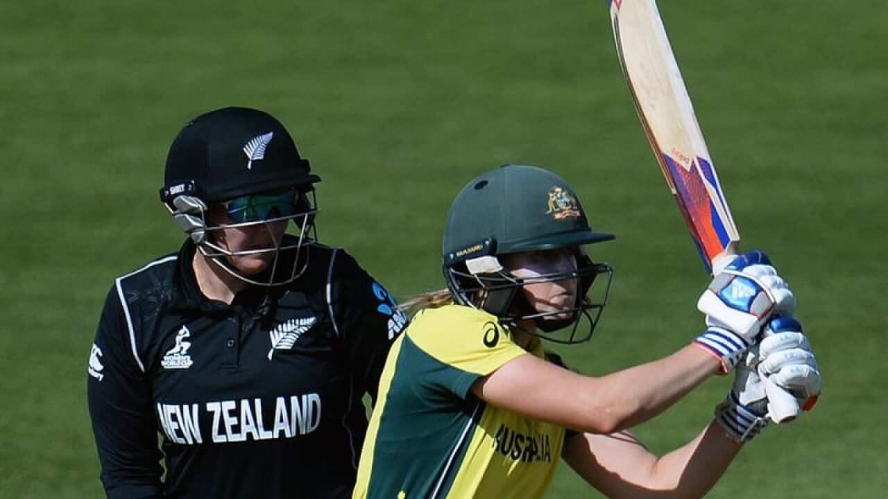 Australian batter Ellyse Perry (right) plays a shot