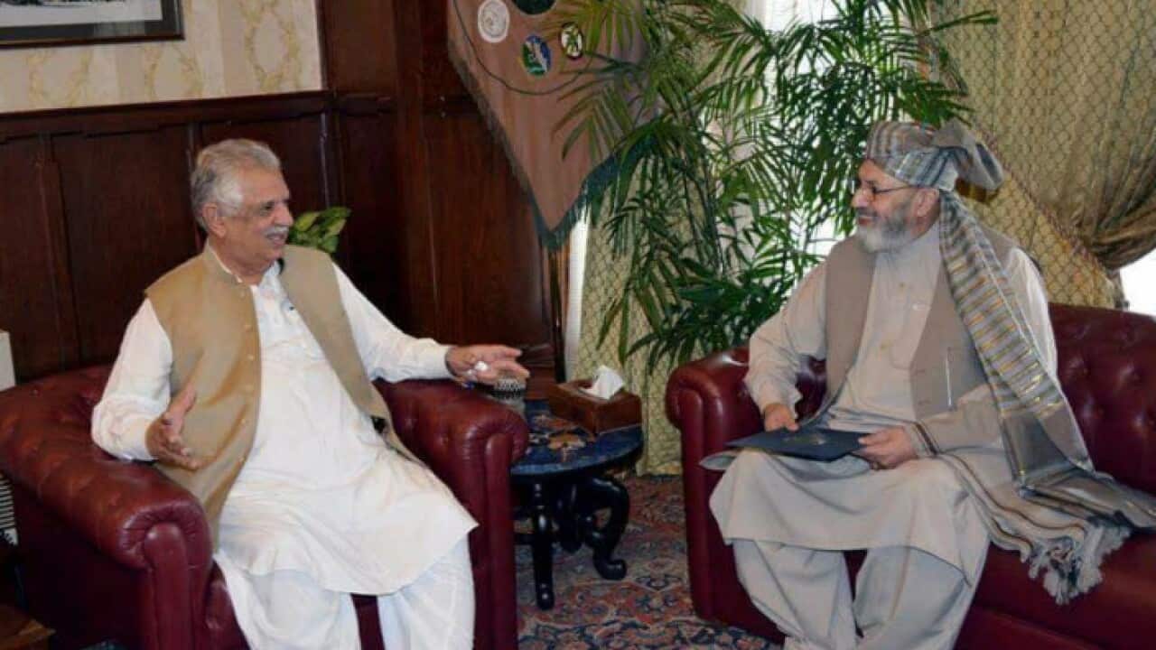 Afghan consul general Moeen Marastial (right) with Governor of Khyber PaKhtoonkhwa