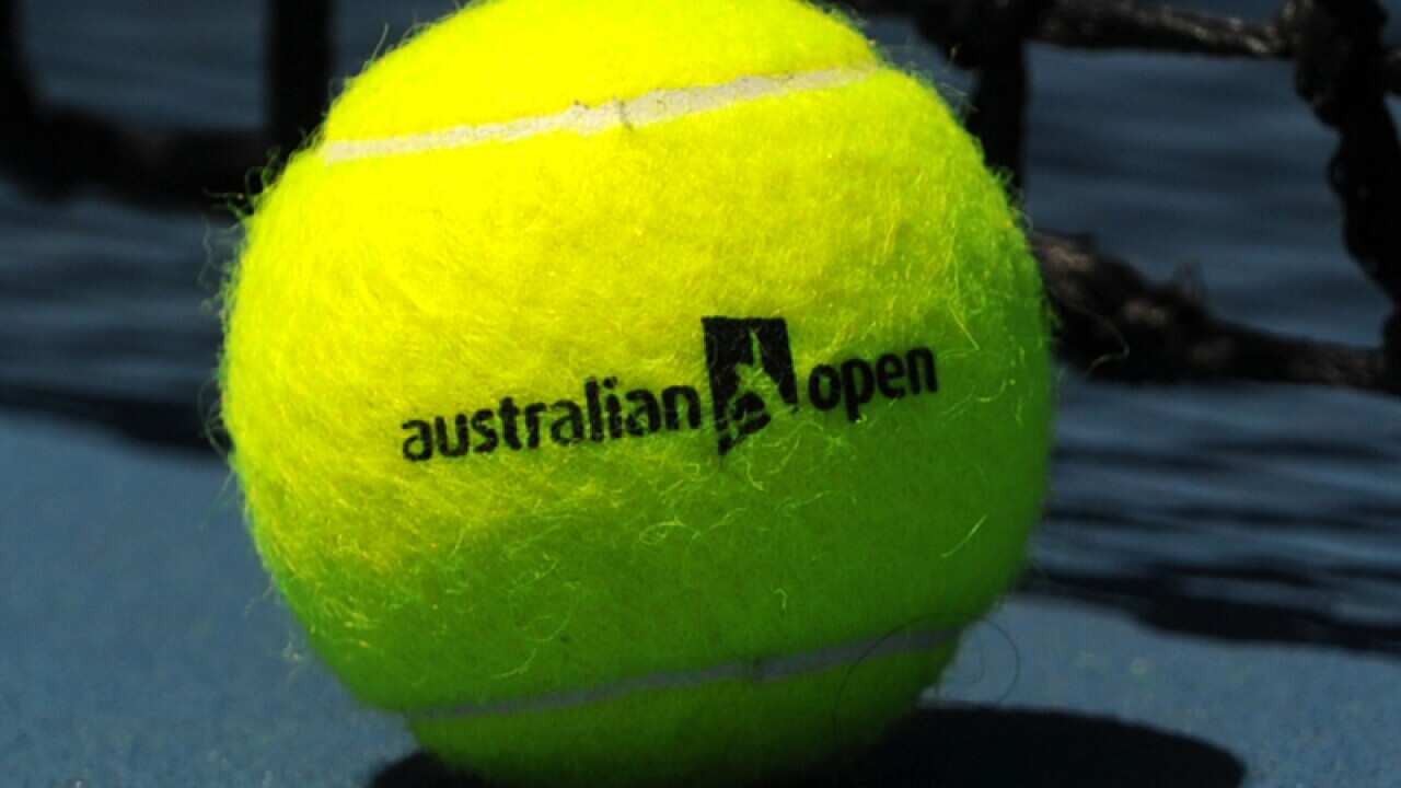A file photo of a tennis ball showing an Australian Open logo