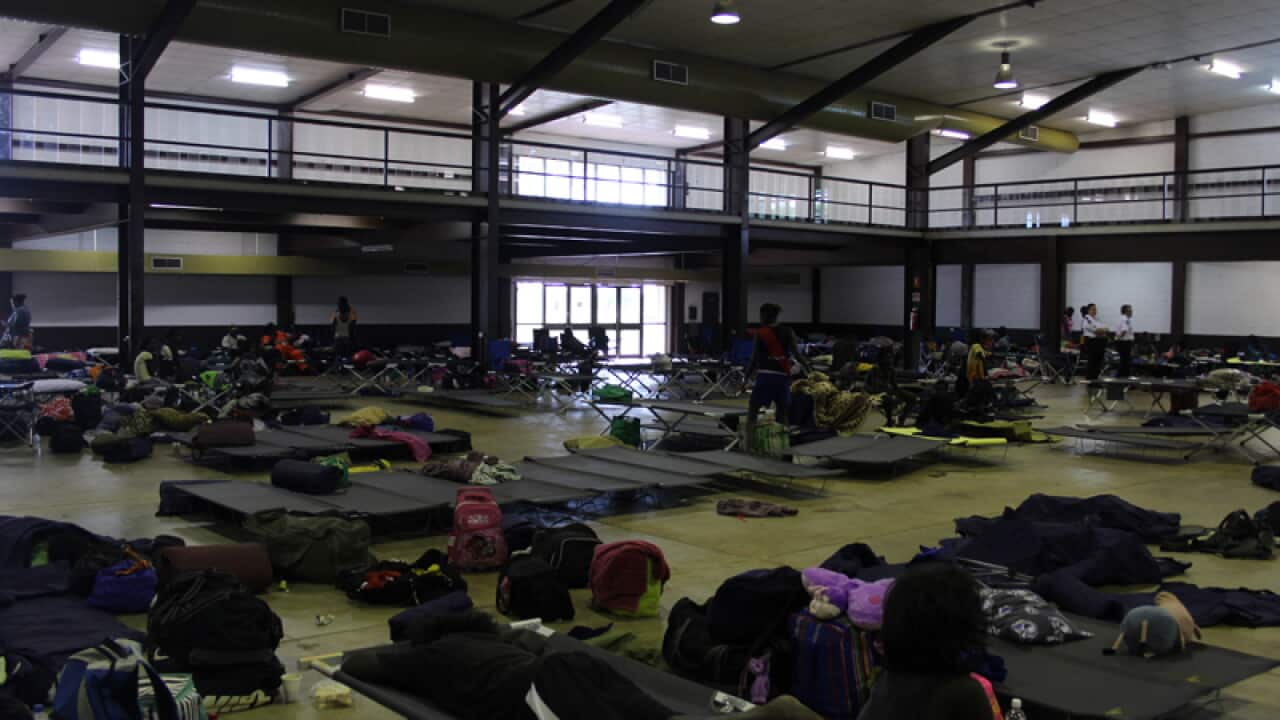 Members of a remote indigenous community in an evacuation centre
