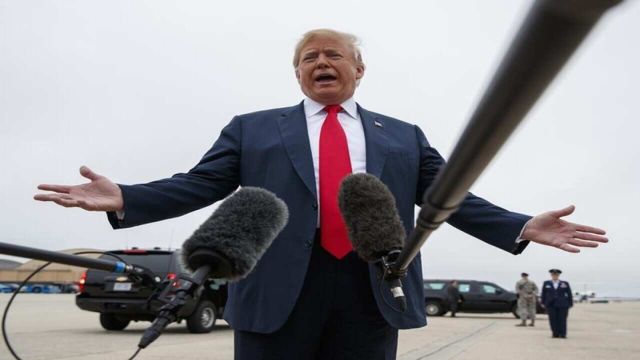US President Donald Trump addresses the media