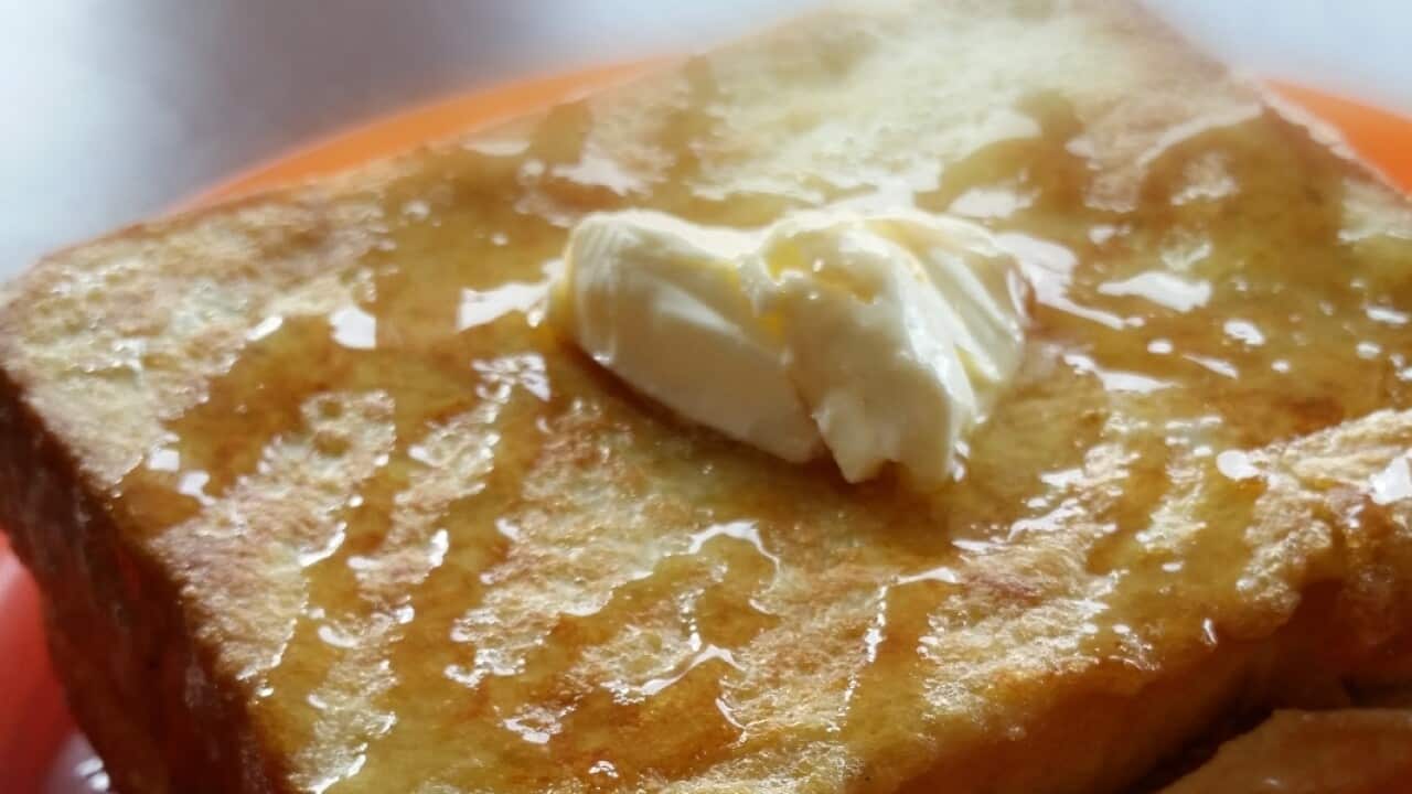 Close-Up Of Butter On Toasted Bread