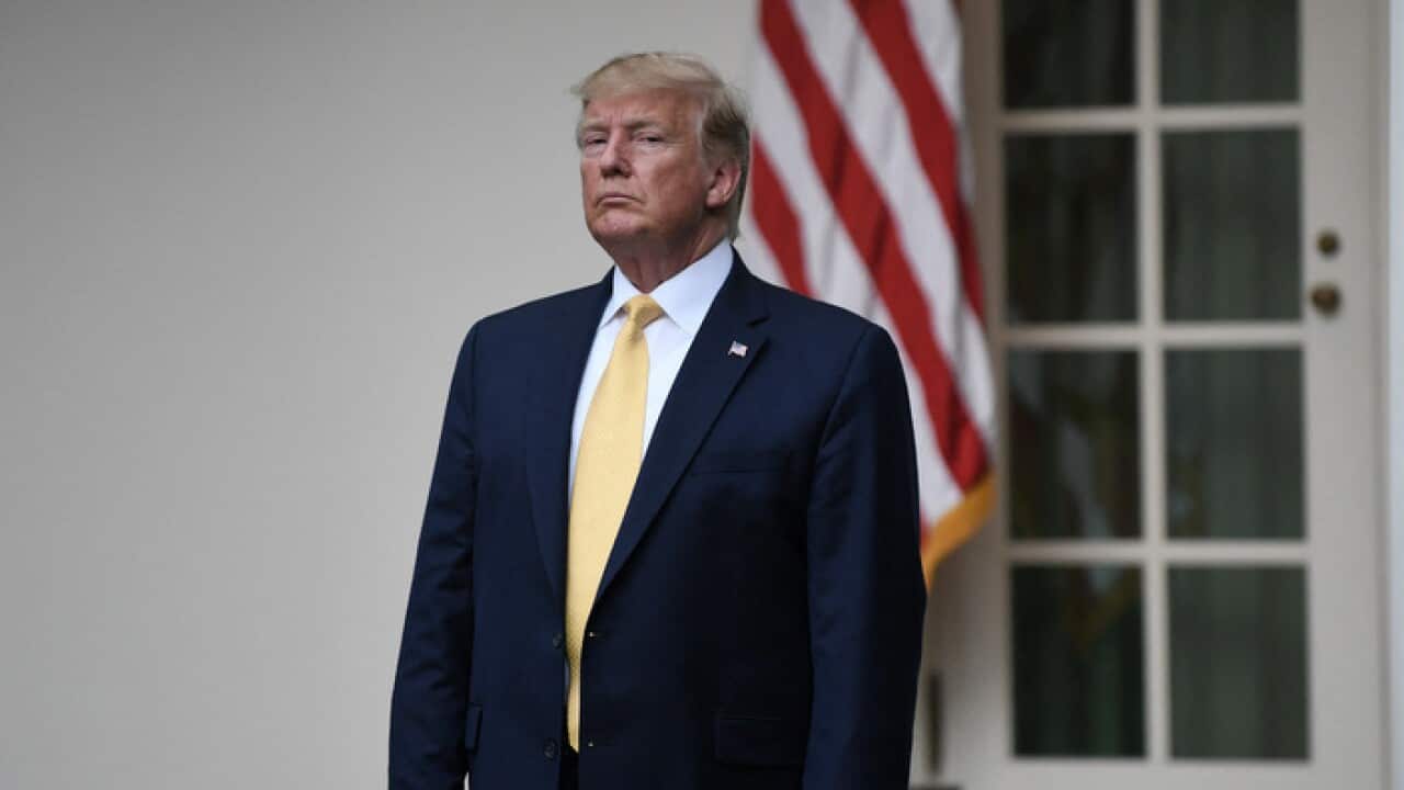 US President Donald Trump looks on during a news conference about U.S. citizenship status for the upcoming 2020 census (AAP)