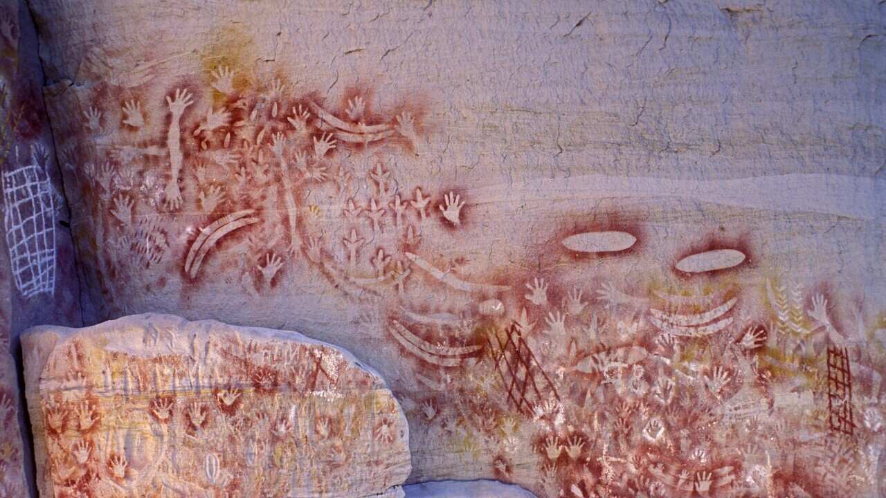 Aboriginal Rock Art - Emu - Boomerang and Hands (AAP/Mary Evans/Ardea/John Cancalosi) | NO ARCHIVING, EDITORIAL USE ONLY