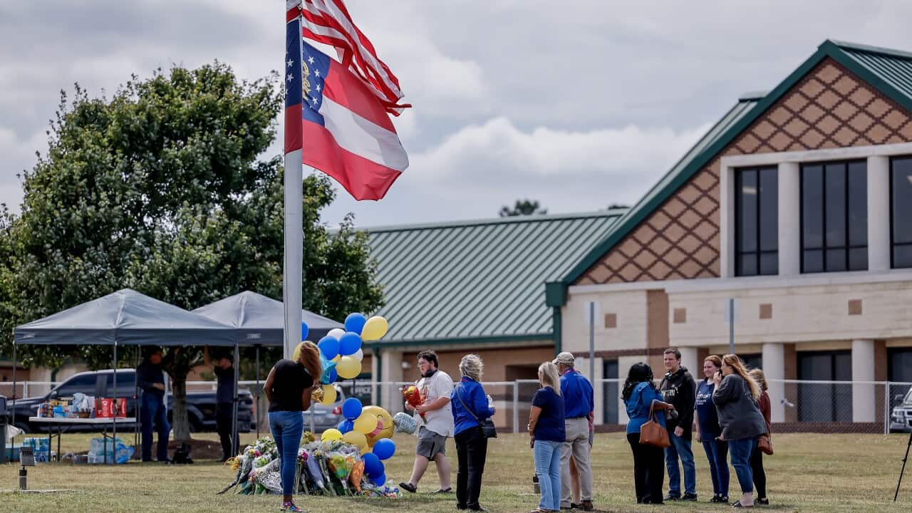 People pay tribute to the victims of the shooting at Apalachee High School in Winder, Georgia