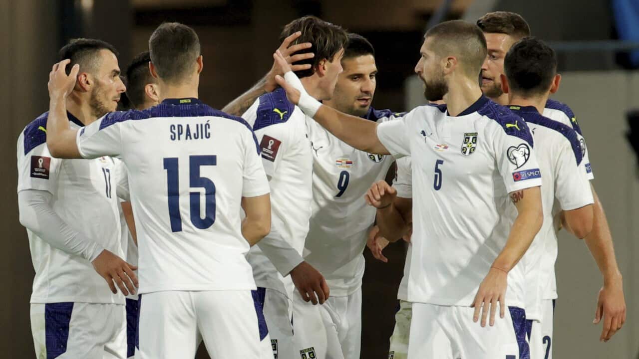 Serbia's Dusan Vlahovic (centre) celebrates with teammates after scoring a goal against Luxembourg. World Cup 2022, Serbia, football