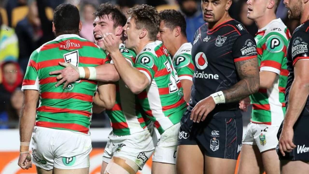 Greg Inglis captain of the Rabbitohs scores a try.