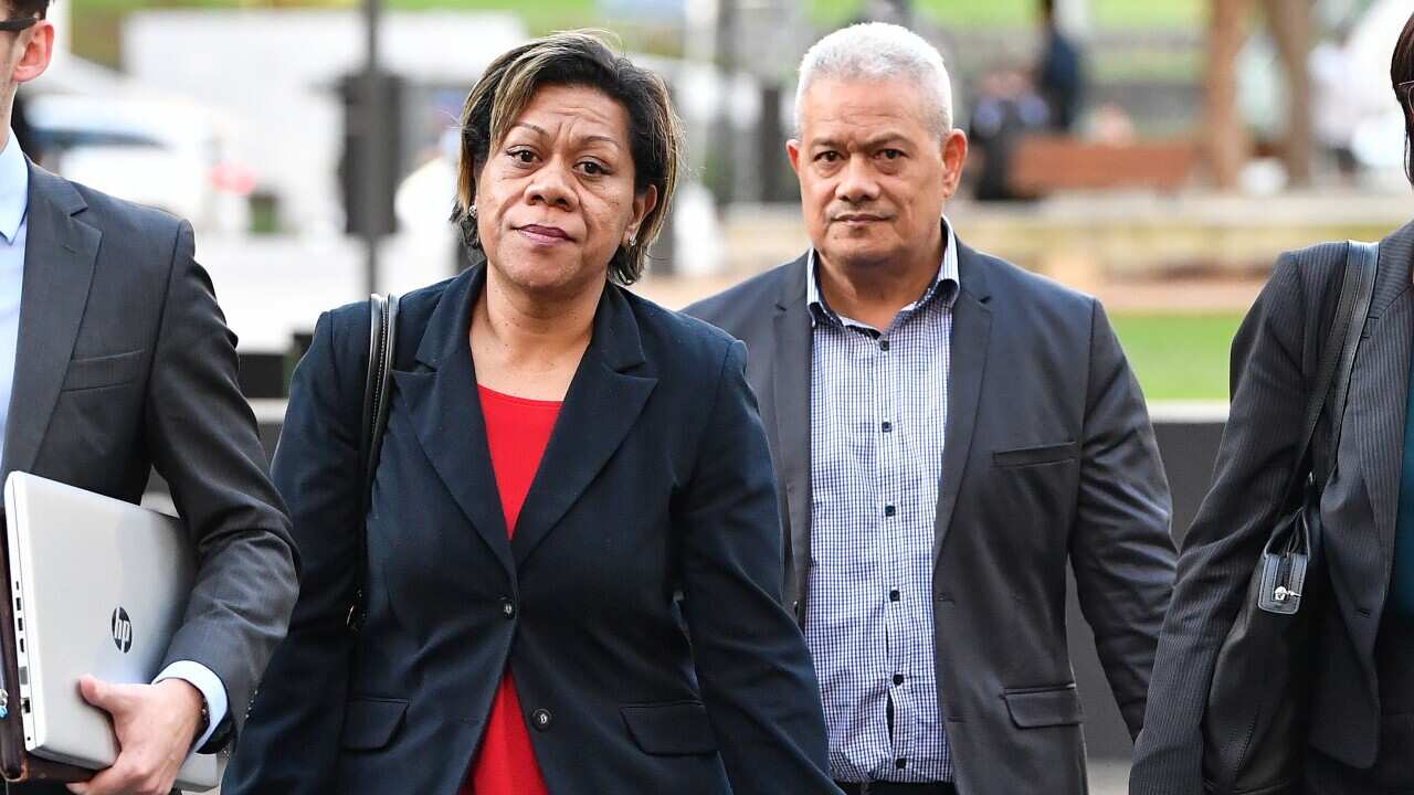 Malavine Pulini (left) and Isikeli Feleatoua Pulini (right) are seen leaving the Brisbane District Court, in Brisbane, Thursday, April 11, 2019.