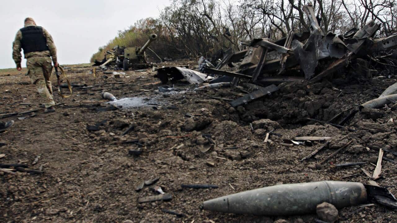ukrainian_soldier_passes_destroyed_equipment_aap.jpg