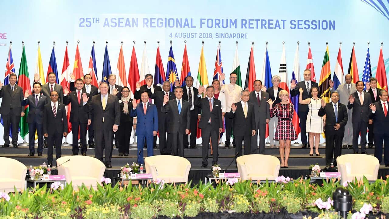 Asia-Pacific foreign ministers pose for photos at the ASEAN Regional Forum meeting in Singapore.