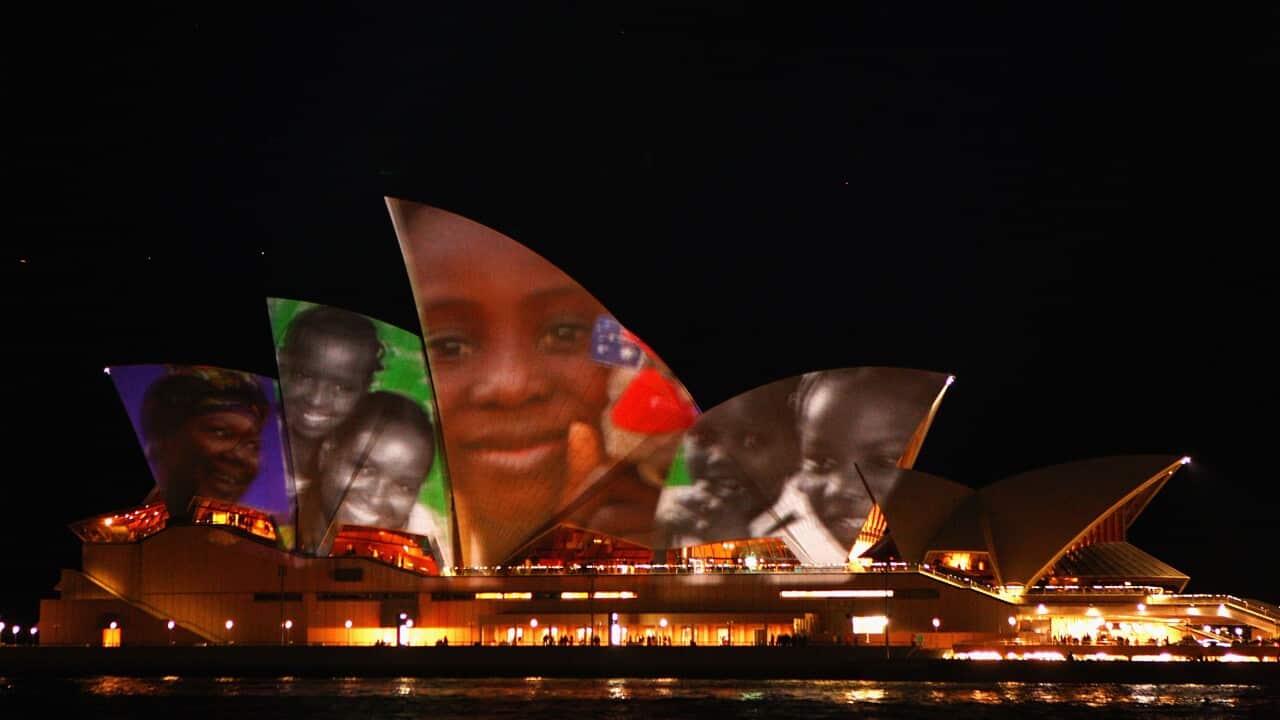 Make Poverty History Projects Faces Onto The Sydney Opera House