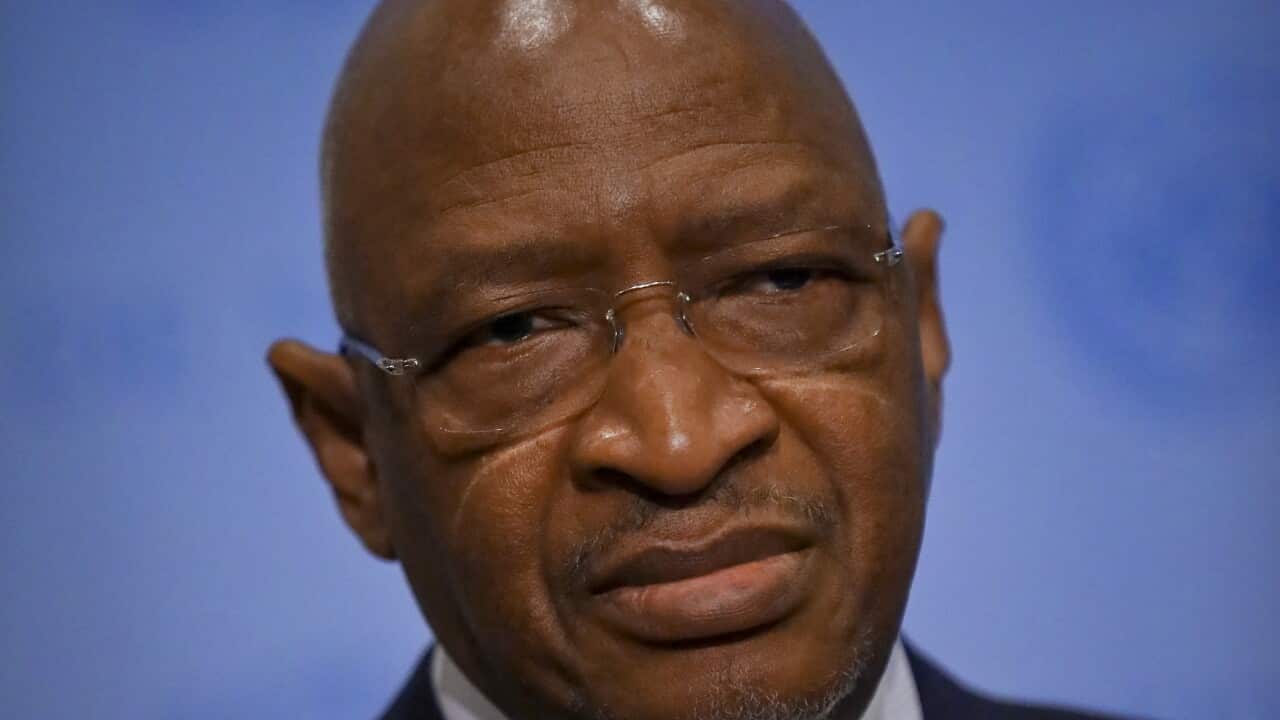Prime Minister of Mali Soumeylou Boubèye Maïga listens, during a press briefing before his address to a meeting in the United Nations Security Council, hosted by France at U.N. headquarters, Friday March 29, 2019. (AP Photo/Bebeto Matthews)