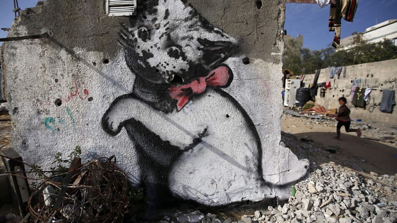 A graffiti mural of a kitten, by Banksy in the northern Gaza Strip