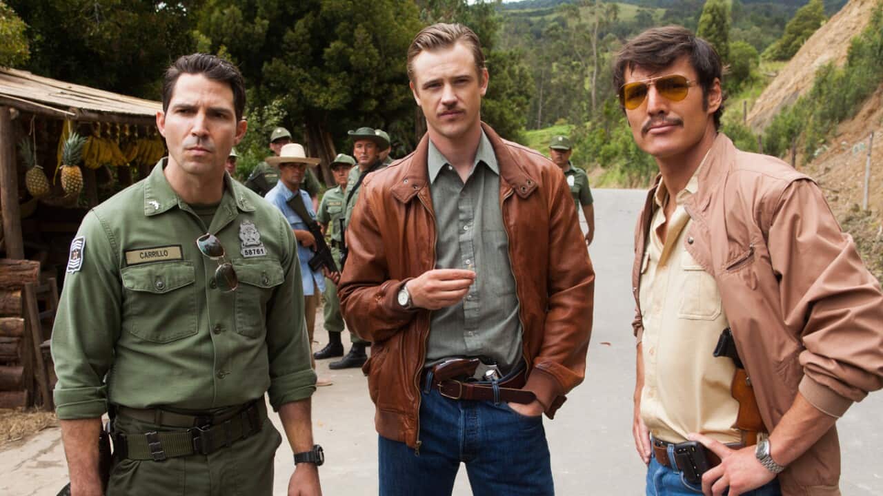Steve Murphy (Boyd Holbrook, centre) and Javier Peña (Pedro Pascal, right) hunted Pablo Escobar with Colombian police. (Maurice Compte, left)