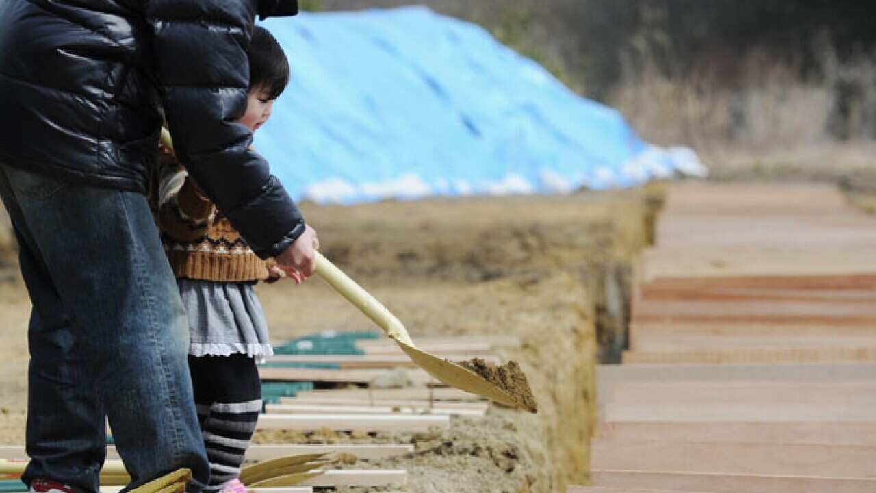 japan_burial_B_ap_kyodonews_110324_236504905