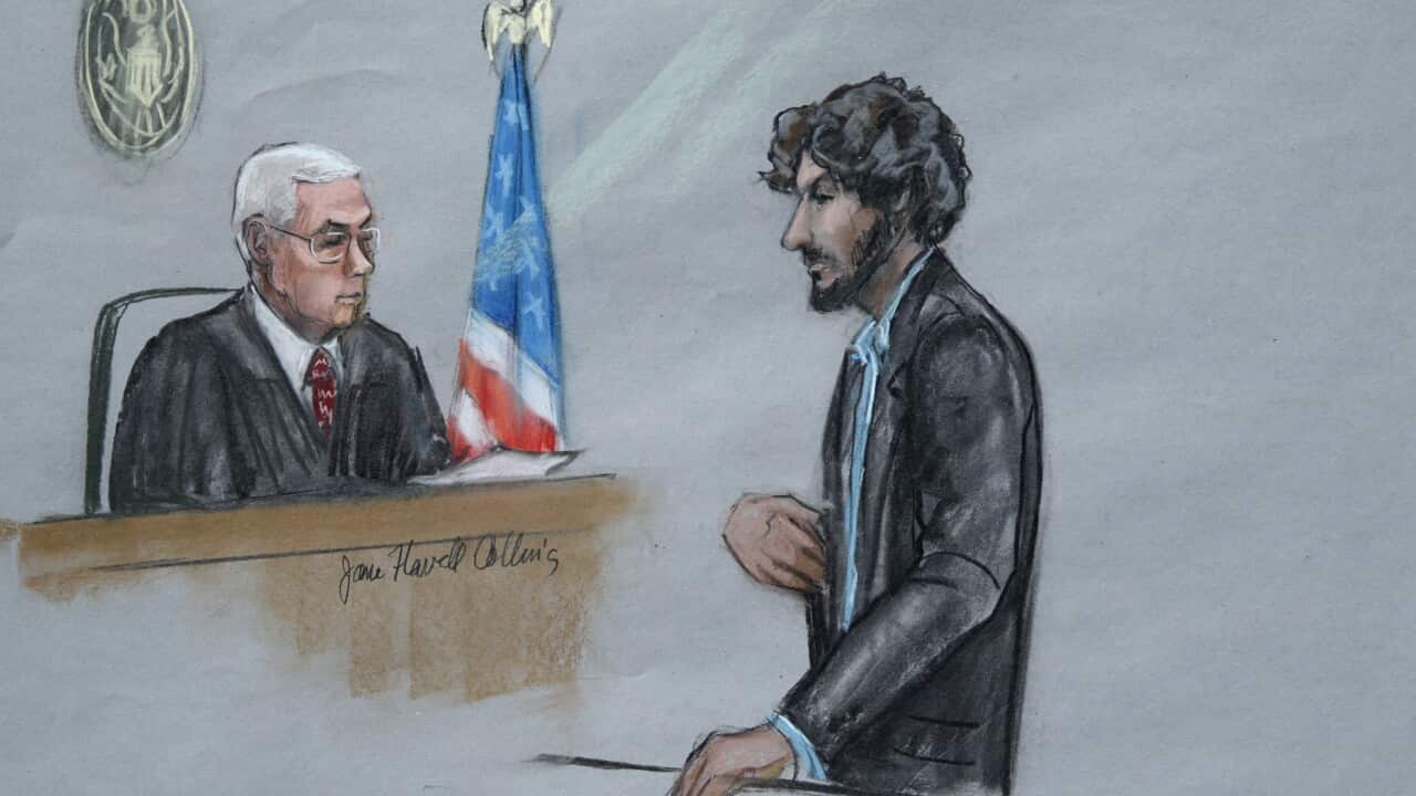 This courtroom sketch shows Boston Marathon bomber Dzhokhar Tsarnaev, right, stands before US District Judge George O'Toole Jr. as he addresses the court during his sentencing on June 24, 2015