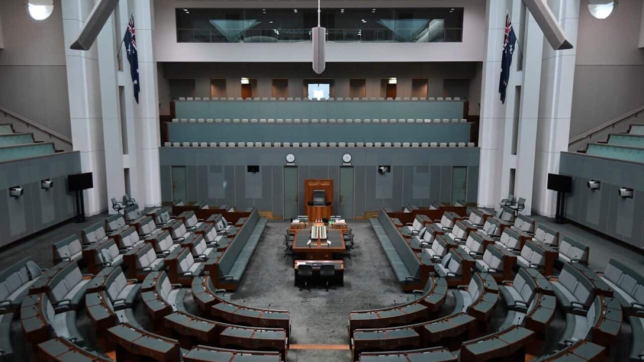 The empty chamber of the House of representatives is seen at Parliament House in Canberra.