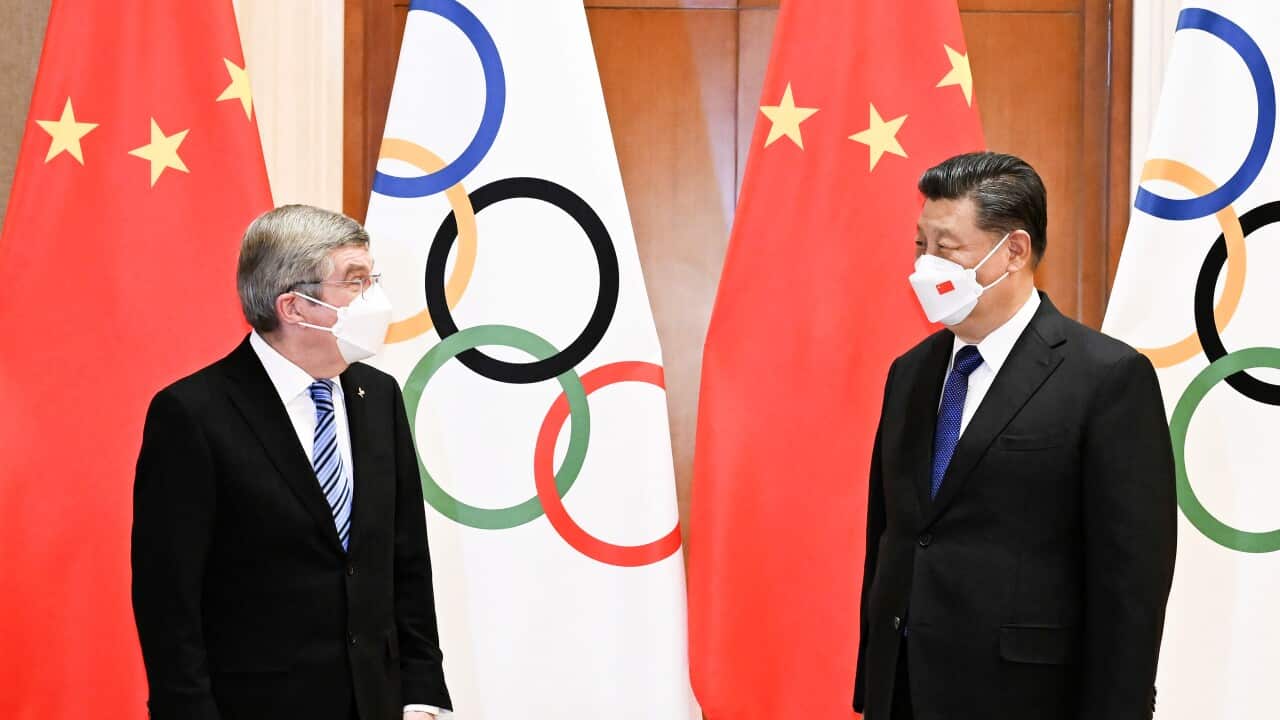International Olympic Committee President Thomas Bach, left, and Chinese President Xi Jinping, right, meeting in Beijing, January 25, 2022.