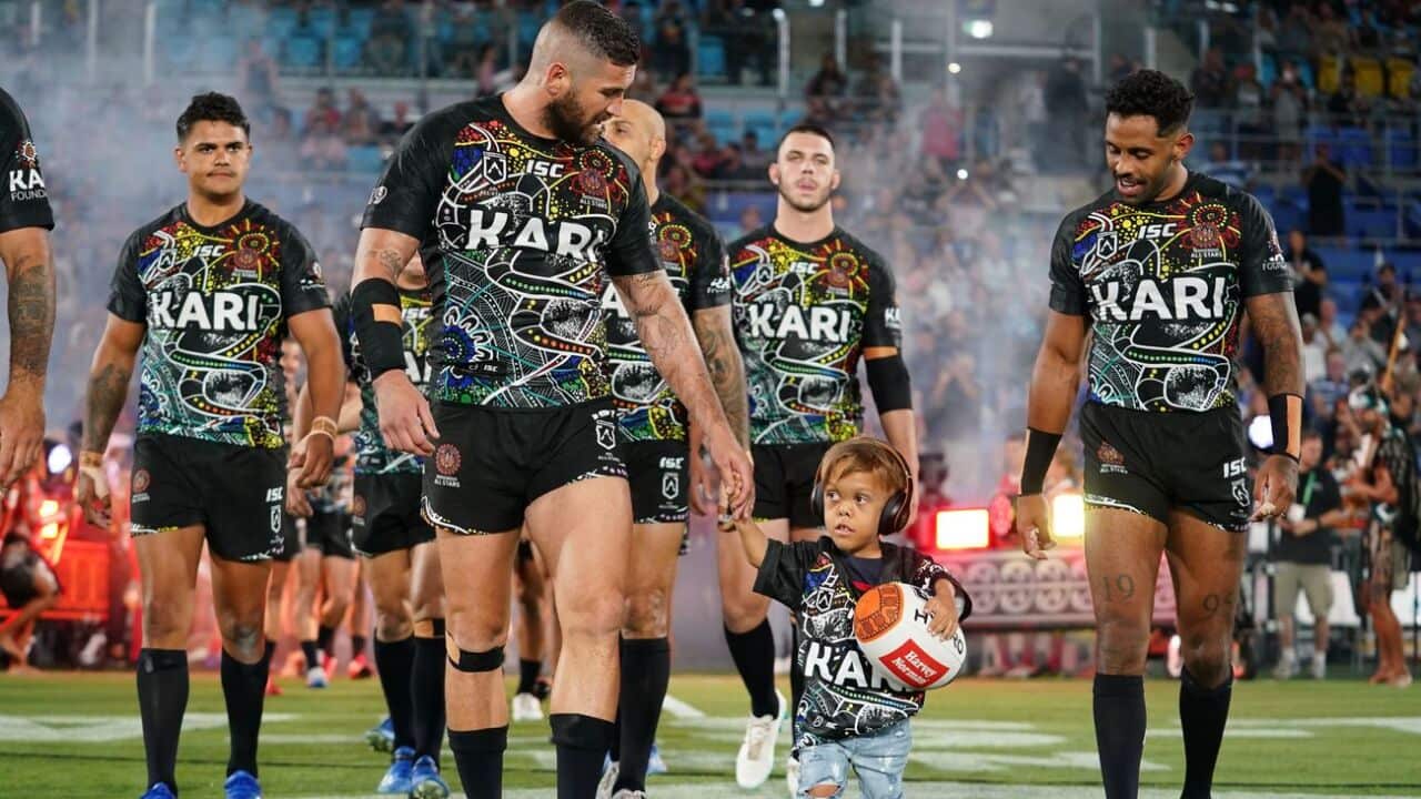 Quaden Bayles, (9), leads the Indigenous All Stars