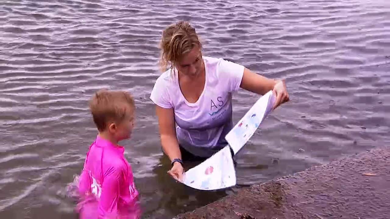 Erika Gleeson with Harrison in the water