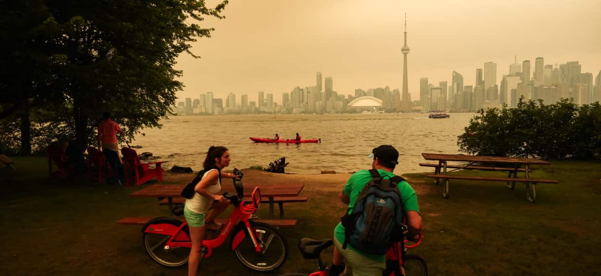 In pictures: Canada's wildfires blanket millions in sepia smoke