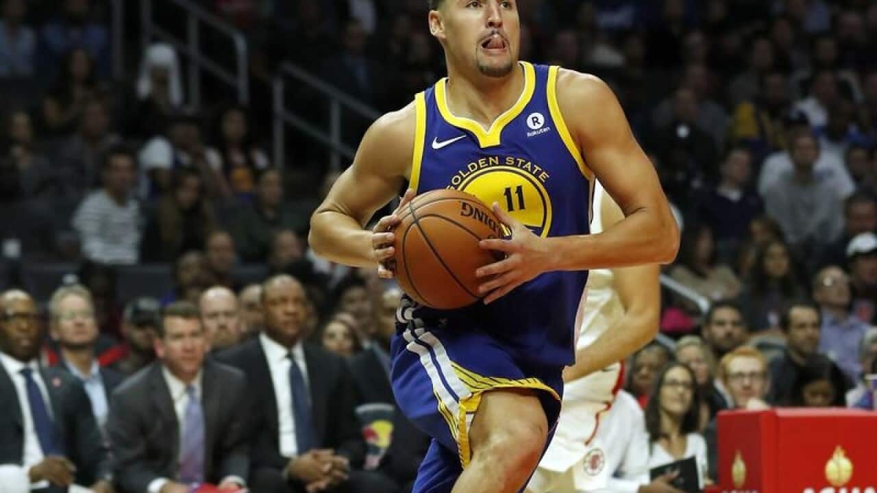Golden State Warriors guard Klay Thompson goes to the basket.