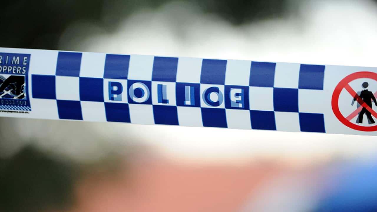 Police tape outside a home