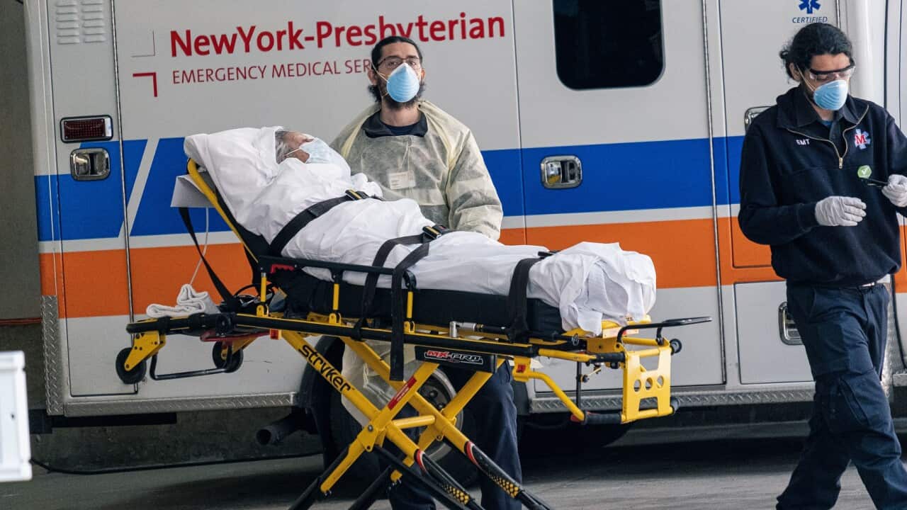 Amid the ongoing COVID-19 epidemic, an EMT moves a patient to an ambulance near the emergency room entrance to the New York-Presbyterian Lower Manhattan Hospital in New York , NY, USA on Wednesday, April 15, 2020. (Photo by Albin Lohr-Jones/Sipa USA)
