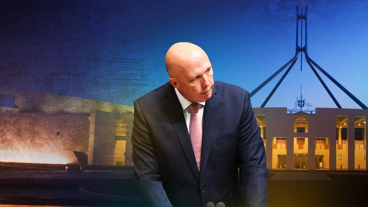 A man in a blue suit.