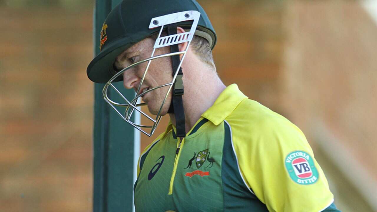 Australian batsman George Bailey leaves the pitch