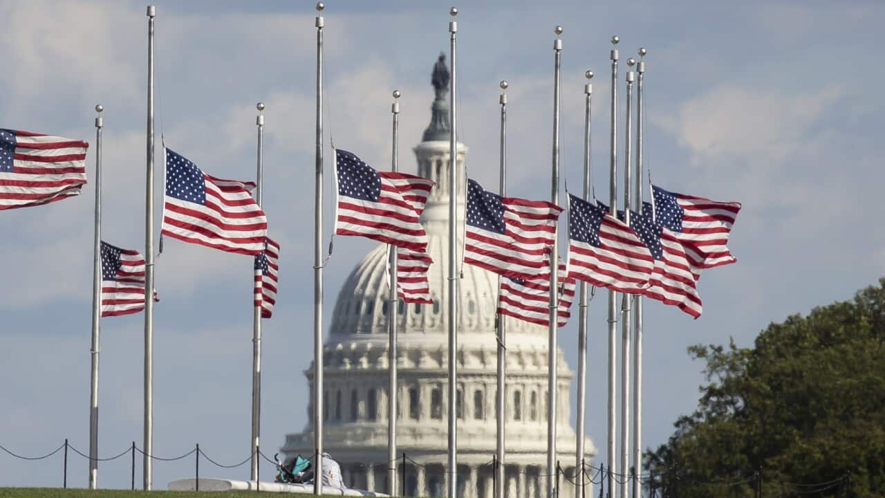 US flags at half mast near the US Capitol to honour Colin Powell