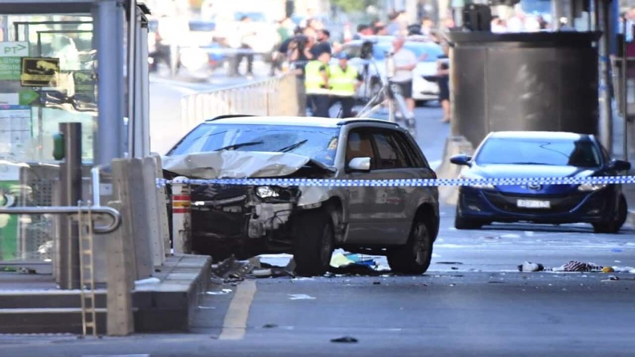 A damaged vehicle is seen at the scene of an incident in Melbourne
