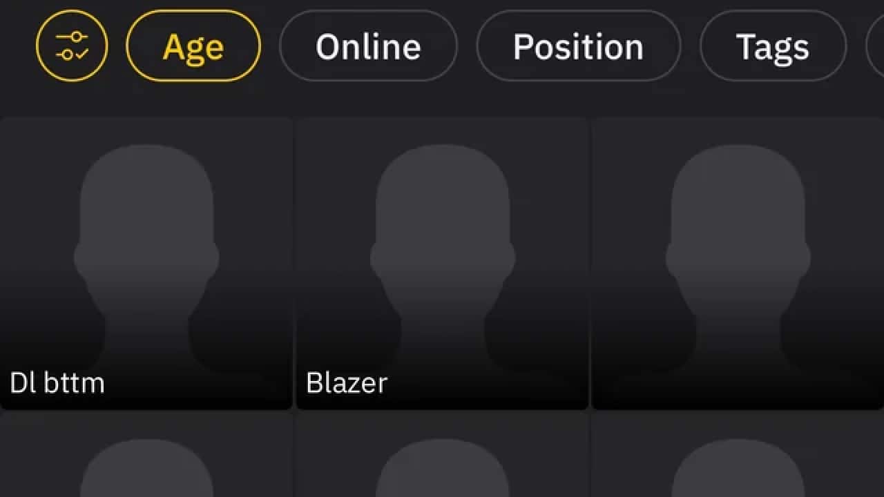 Grindr app showing a grid of blank boxes showing different accounts without any pictures