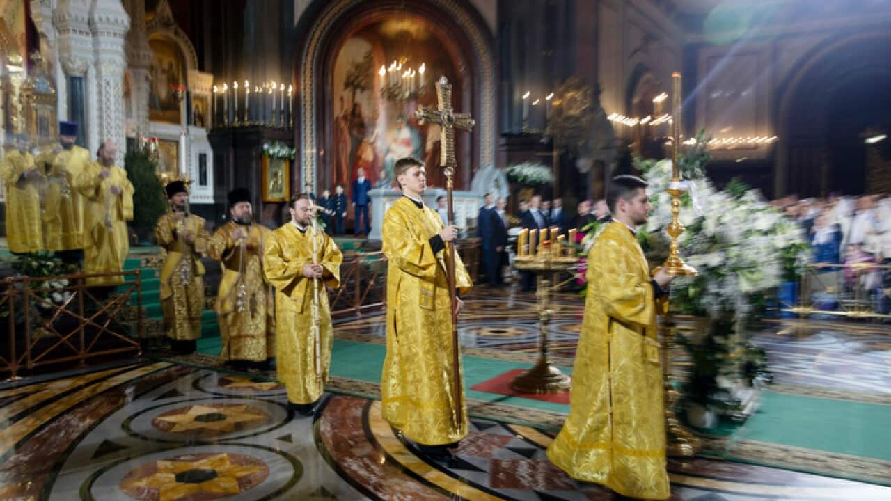 Russian Orthodox priests during the Christmas mass in the Christ the Saviour Cathedral in Moscow. (AAP)