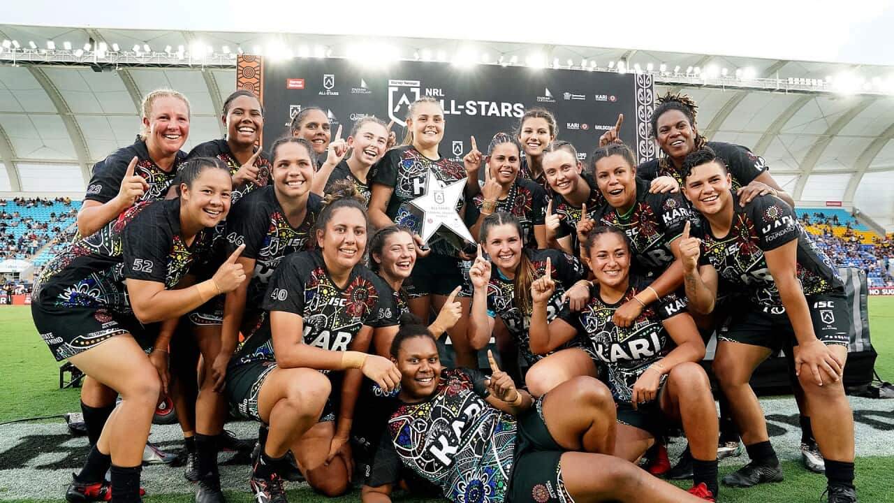The Indigenous Womens Team pose for a team photo after defeating the Maori Women All Stars team at CBus Super Stadium on the Gold Coast, Saturday, February 22, 2020