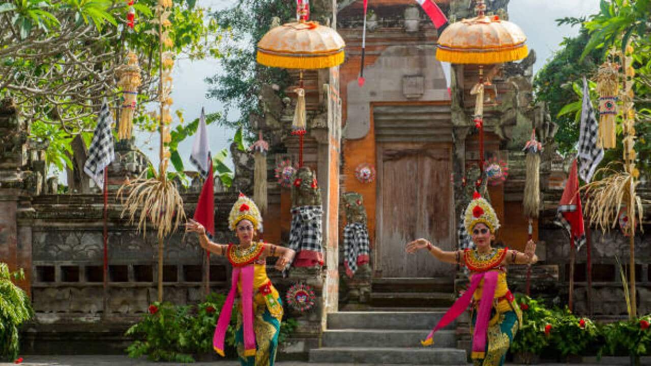 Women dancers during the Barong and Kris dance, which tells a battle between good and evil spirit, performed in Batubulan, Bali Indonesia, 2019/05/23. (Photo by Wolfgang Kaehler/LightRocket via Getty Images).